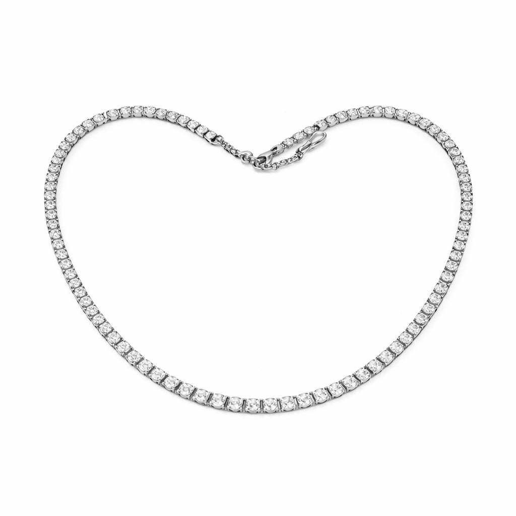 Silver necklace with heart-shaped clasp on a white background