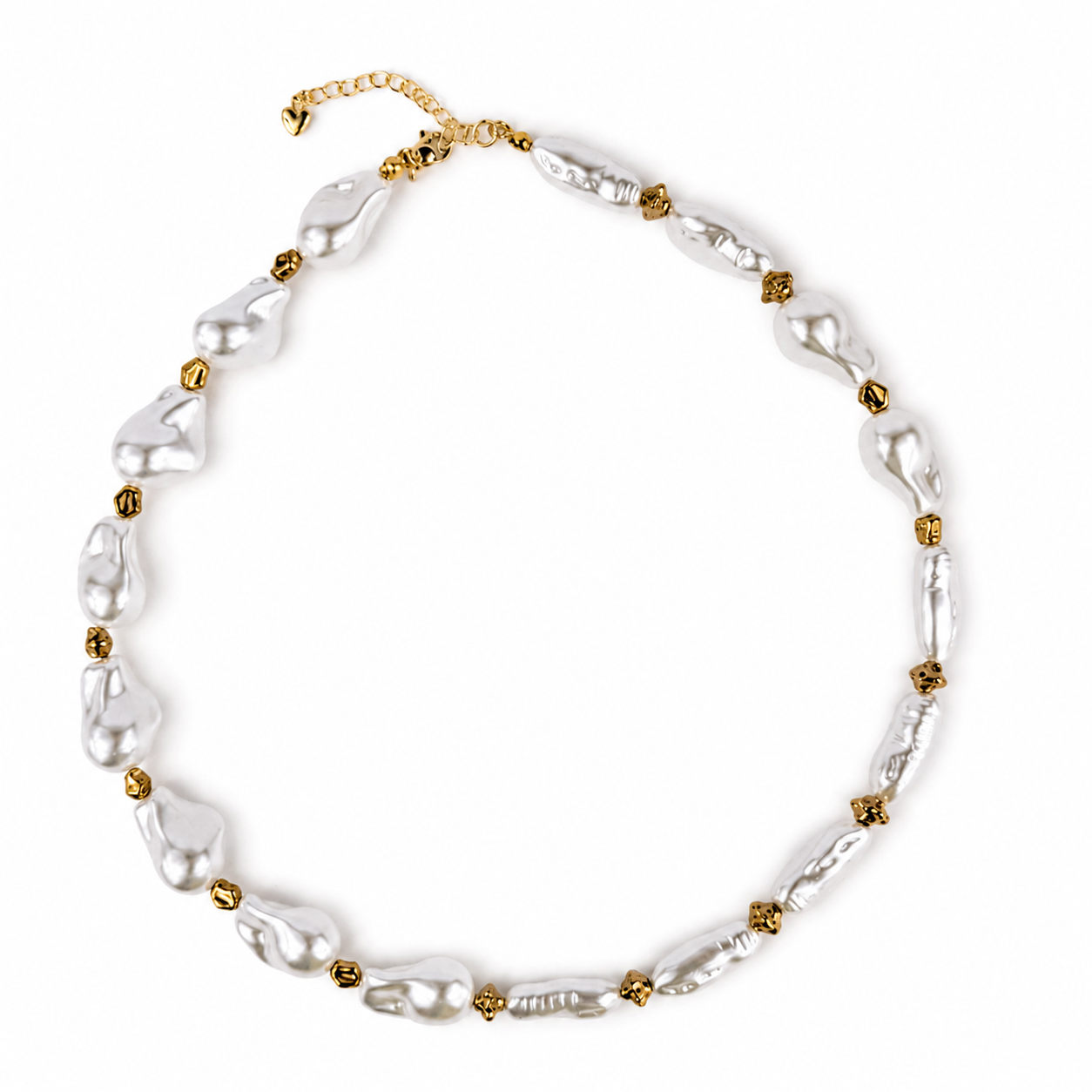 A baroque pearl necklace with small gold spacer beads, arranged in a circle on a clean white background.