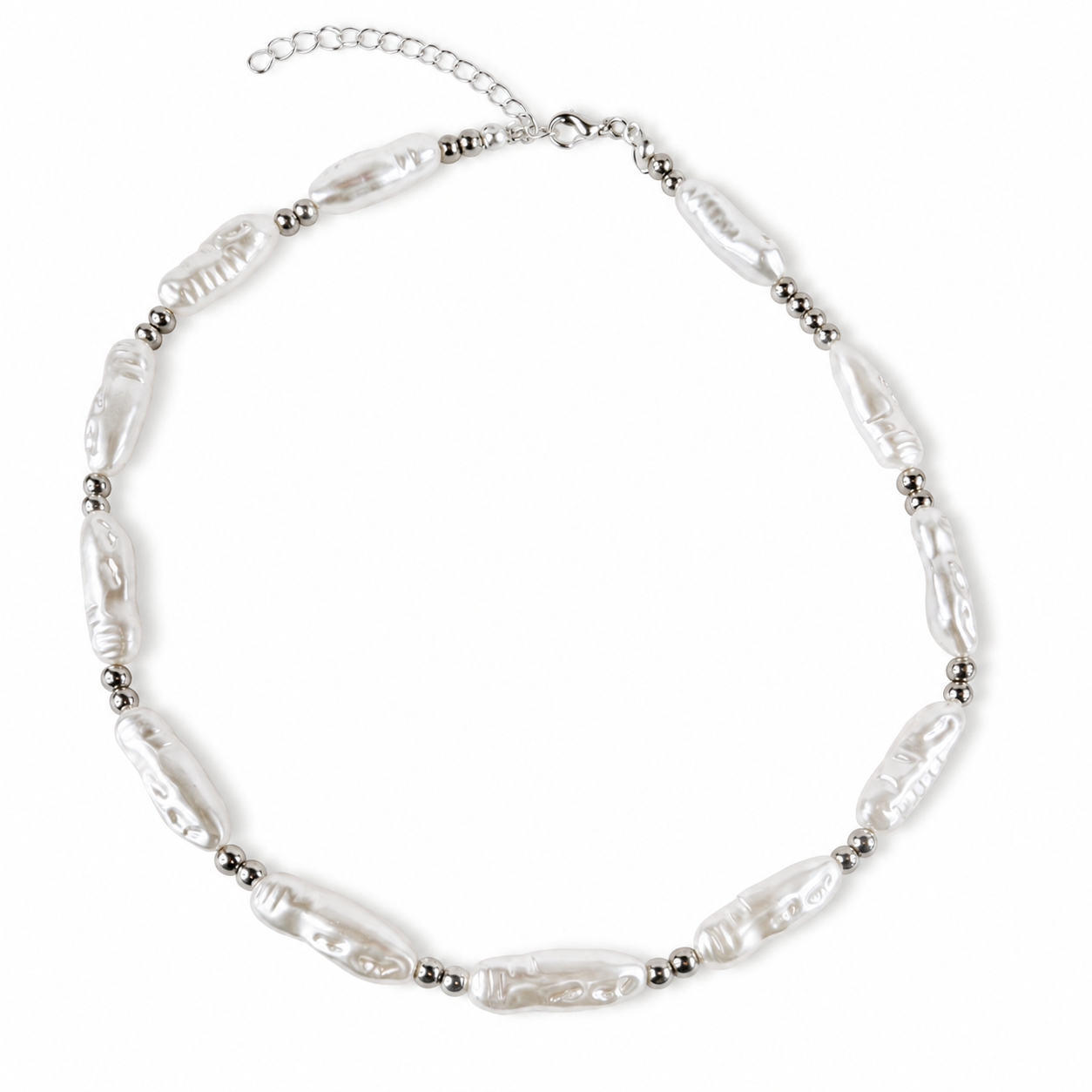 A silver-toned beaded necklace featuring irregular, baroque-style white pearls separated by small metallic beads, with a silver chain extender clasp, shown on a plain white background.