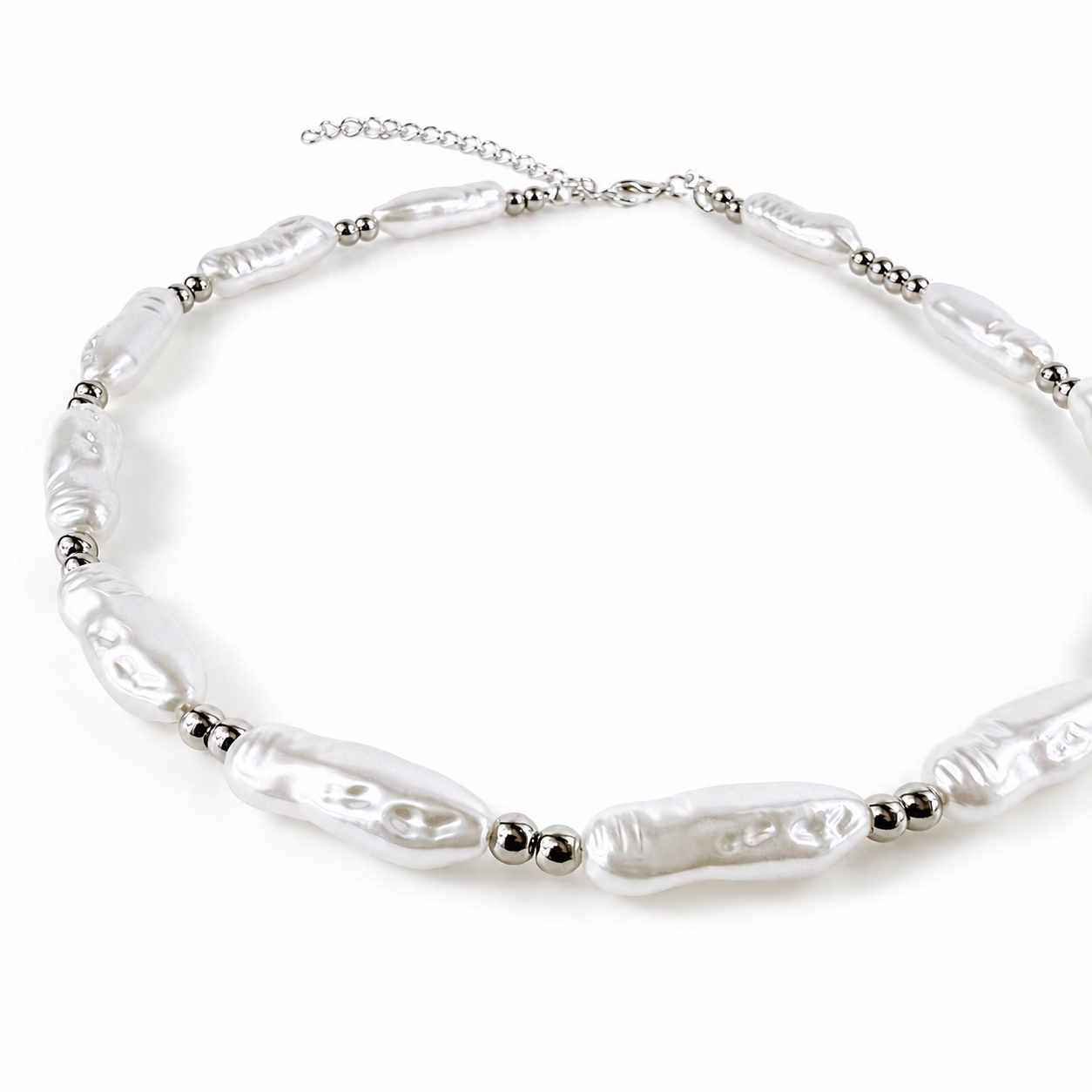 A silver-toned beaded necklace featuring irregular, baroque-style white pearls separated by small metallic beads, displayed on a clean white background.