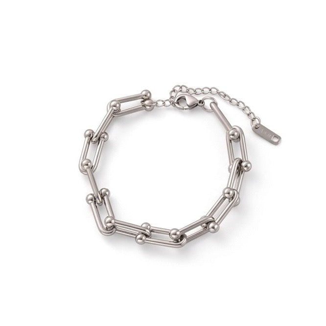 Silver chain bracelet on a white background