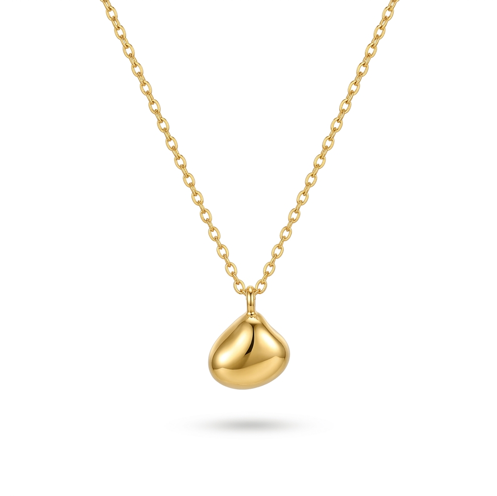 Gold necklace with a teardrop pendant on a white background