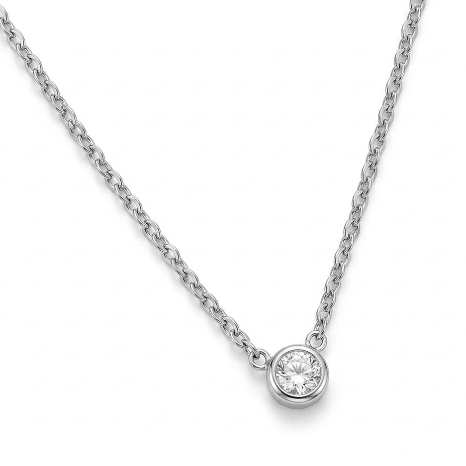 Silver necklace with a round diamond pendant on a white background